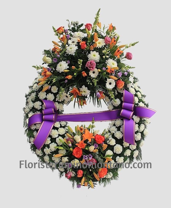 Corona de flores fúnebres variadas para enviar al tanatorio